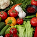 side view of vegetables as tomato garlic pepper cucumber and others with spices